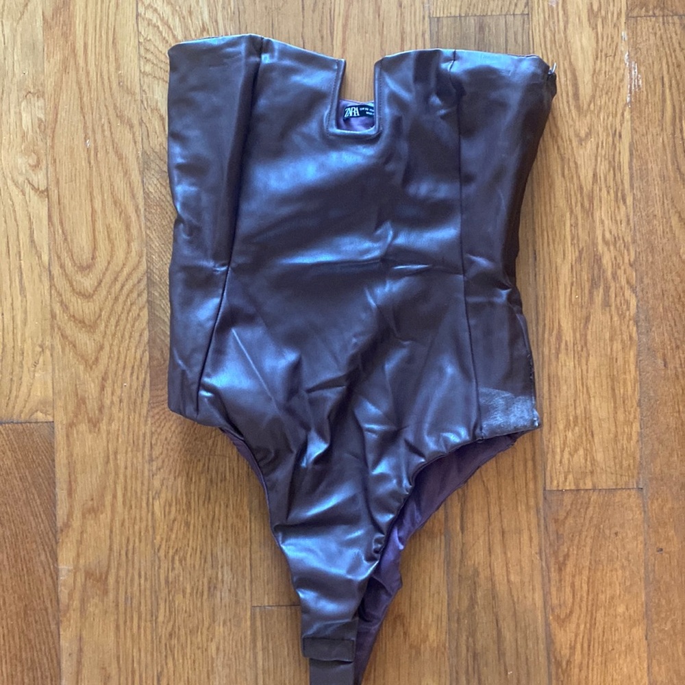 Brown leather body suit